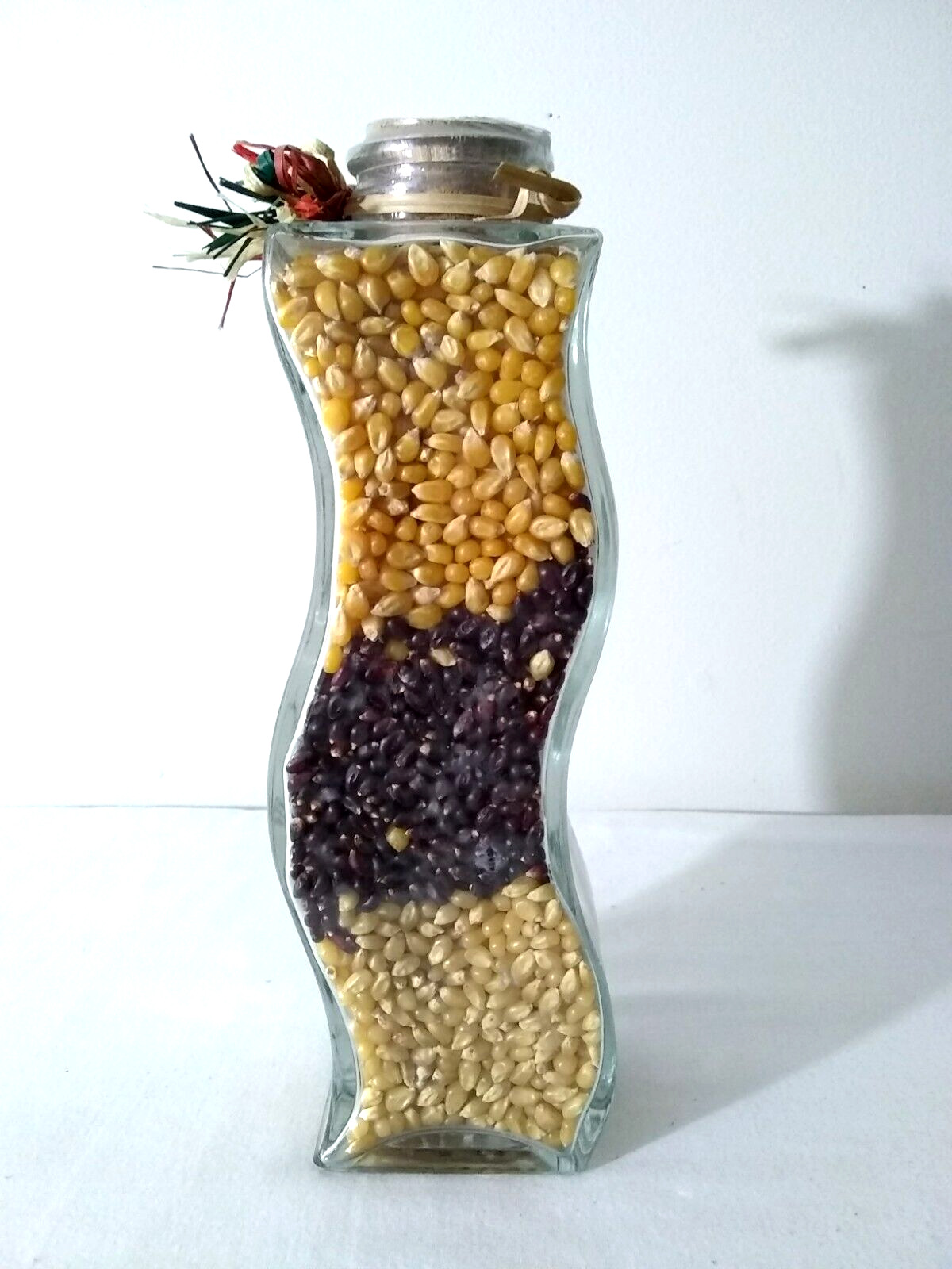 Popcorn Infused Kitchen Decor With Decorative Swivel Glass Bottle